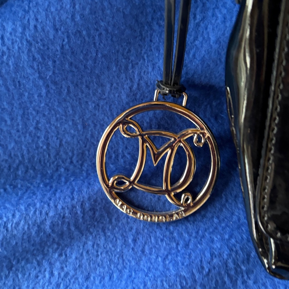 Glossy Black Crossbody Bag with Logo Charm